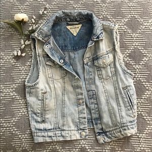 Distressed jean vest
